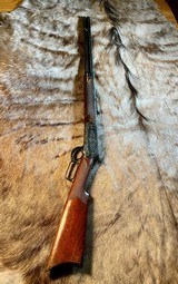 Winchester 1886 in 38-70 custom engraved
