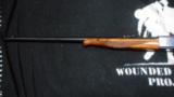 Deluxe Remington 24 engraved by Pachmayr's gunsmith. - 7 of 15