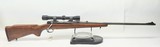 Winchester Model 70, 300 H&H magnum with threaded barrel and classic Redfield 1