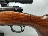 Winchester Model 70, 300 H&H magnum with threaded barrel and classic Redfield 1