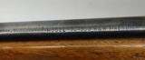 Winchester Model 70, 300 H&H magnum with threaded barrel and classic Redfield 1