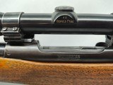 Winchester Model 70, 300 H&H magnum with threaded barrel and classic Redfield 1