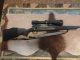 Weatherby Mark V Synthetic in .340 Weatherby Mag with scope, strap and ammo sleeve - 2 of 13