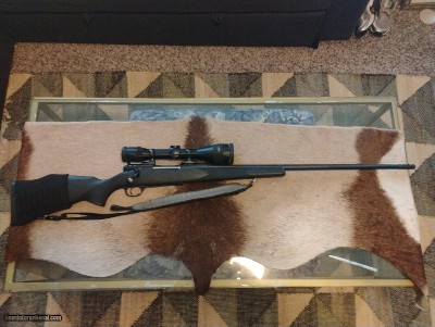 Weatherby Mark V Synthetic in .340 Weatherby Mag with scope, strap and ammo sleeve