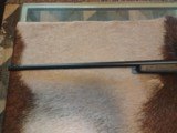Weatherby Mark V Synthetic in .340 Weatherby Mag with scope, strap and ammo sleeve - 9 of 13