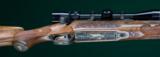 Harry Lawson --- Custom Winchester Model 70 --- 7mmSTW --- Engraved and carved by Norbert Triebel - 1 of 13