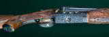 Winchester --- Deluxe Skeet Grade, Custom Model 21 Two Barrel Set --- 12 Gauge --- Engraved by Arnold Griebel - 4 of 13