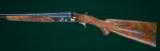 Winchester --- Deluxe Skeet Grade, Custom Model 21 Two Barrel Set --- 12 Gauge --- Engraved by Arnold Griebel - 5 of 13
