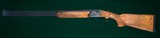 Beretta --- 682 Gold
Trap ---12ga, 2 3/4" --- With Briley 20ga, 28ga & .410 Tube Set - 9 of 9