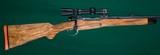 Jerry Fisher --- Custom Oberndorf Magnum Mauser Squarebridge --- .375 H&H Magnum --- Engraved by Dan Goodwin - 1 of 8