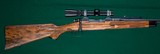 Gene Simillion --- Custom Winchester Model 70 --- .30-338 --- Engraved by Mitch Moschetti
