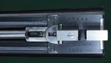 Armas Garbi --- Model De Luxe, Cased, Consecutive Pair, Self-Opening Sidelock Ejectors --- 12 Gauge, 2 3/4