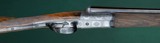John Dickson & Sons --- Consecutive pair, Round Action Shotguns --- 12 Gauge, 2 3/4