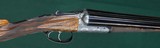 John Dickson & Sons --- Consecutive pair, Round Action Shotguns --- 12 Gauge, 2 3/4