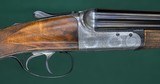 John Dickson & Sons --- Consecutive pair, Round Action Shotguns --- 12 Gauge, 2 3/4
