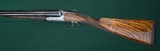 John Dickson & Sons --- Consecutive pair, Round Action Shotguns --- 12 Gauge, 2 3/4