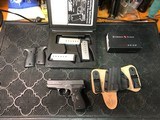 Kahr K9 9mm with Crimson Trace Laser Grips - Image 1 of 8