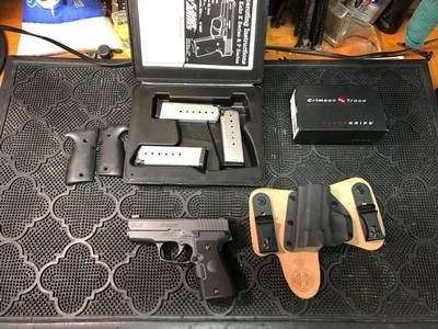 Kahr K9 9mm with Crimson Trace Laser Grips - Image 1 of 8