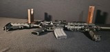 ARMALITE M15 5.56 with Redfield 4–12x Scope - 15 of 15