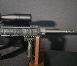 ARMALITE M15 5.56 with Redfield 4–12x Scope - 12 of 15