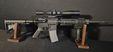 ARMALITE M15 5.56 with Redfield 4–12x Scope - 9 of 15