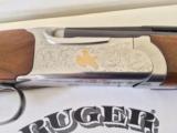 RUGER RED LABEL 28ga
DELUXE FACTORY ENGRAVED O/U w/ BOX - 1 of 11