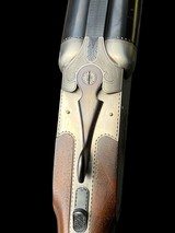 HEYM 88B
- DELUXE
ENGRAVED ELEPHANT / CAPE BUFFALO SIDEPLATE SAFARI DOUBLE RIFLE
-- 375 H&H
- AS NEW - 10 of 19