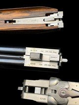 HEYM 88B
- DELUXE
ENGRAVED ELEPHANT / CAPE BUFFALO SIDEPLATE SAFARI DOUBLE RIFLE
-- 375 H&H
- AS NEW - 19 of 19