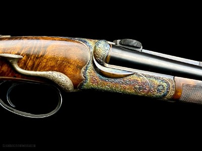 KARL HAUPTMANN --
SIDELEVER DOUBLE RIFLE
-- 8x57
--
SWAROVSKI Z8i CLAW MOUNT SCOPE
--
EXHIBITION WOOD