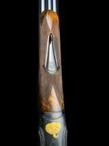 MASSIVE -- AUGUSTE FRANCOTTE
--
600
NITRO
- SIDELOCK DOUBLE RIFLE
--
1940
--
COROMBELLE ENGRAVED - 8 of 20