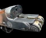 MASSIVE -- AUGUSTE FRANCOTTE
--
600
NITRO
- SIDELOCK DOUBLE RIFLE
--
1940
--
COROMBELLE ENGRAVED - 4 of 20