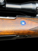 HOLLAND & HOLLAND --
375 H&H BELTED MAG
-- MAGNUM MAUSER TAKEDOWN BOLT ACTION RIFLE
-- ZEISS SCOPE
-- MADE 1968 - 9 of 17