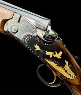 STUNNING EXHIBITION GRADE BERETTA
--
S04 -- FUNERAL / GOLD GAME SCENE - VOLPI ENGRAVED - 30