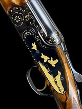 STUNNING EXHIBITION GRADE BERETTA
--
S04 -- FUNERAL / GOLD GAME SCENE - VOLPI ENGRAVED - 30