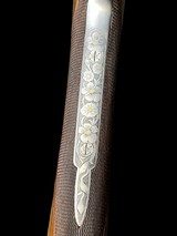 UNIQUE & RARE
-
PERUGINI & VISINI
-
TRIPLE BARREL
EXHIBITION -
28GA
-
TOMASONI FLORAL & GOLD ENGRAVED
- ULTIMATE QUAIL OR DOVE GUN - 13 of 19