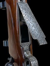 STUNNING --
DAKOTA ARMS --
CUSTOM RIFLE
-
SABATTI ENGRAVED
-
9.3x62 -
TALLEY 30MM QD RINGS - 1 of 16