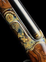 HAUPTMANN --
MODEL DELUXE --
TRIPLE BARREL
--
SxSxS
--
410 SHOTGUN
-
EXQUISITIE GOLD ENGRAVED - 10 of 18