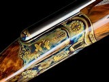 HAUPTMANN --
MODEL DELUXE --
TRIPLE BARREL
--
SxSxS
--
410 SHOTGUN
-
EXQUISITIE GOLD ENGRAVED - 3 of 18