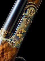 HAUPTMANN --
MODEL DELUXE --
TRIPLE BARREL
--
SxSxS
--
410 SHOTGUN
-
EXQUISITIE GOLD ENGRAVED - 2 of 18