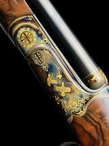 HAUPTMANN --
MODEL DELUXE --
TRIPLE BARREL
--
SxSxS
--
410 SHOTGUN
-
EXQUISITIE GOLD ENGRAVED - 4 of 18