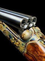 HAUPTMANN --
MODEL DELUXE --
TRIPLE BARREL
--
SxSxS
--
410 SHOTGUN
-
EXQUISITIE GOLD ENGRAVED - 1 of 18