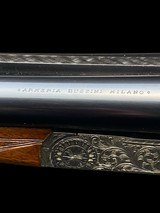 BEAUTIFUL
--
FLLI. RIZZINI
--
R2E
--
20GA
-- GAME GUN
- SCROLL-BACK ACTION
-
SINGLE TRIGGER - 11 of 14