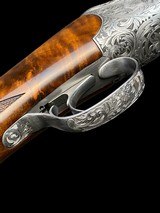 STUNNING-FFLI. BERTUZZI--ROUND BODY O/U -GAME SCENE ENGRAVED- EXHIBITION TURKISH WALNUT- 20GA -30