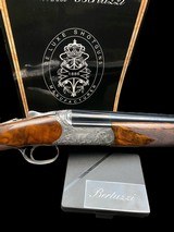 STUNNING-FFLI. BERTUZZI--ROUND BODY O/U -GAME SCENE ENGRAVED- EXHIBITION TURKISH WALNUT- 20GA -30