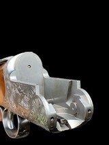 STUNNING-FFLI. BERTUZZI--ROUND BODY O/U -GAME SCENE ENGRAVED- EXHIBITION TURKISH WALNUT- 20GA -30
