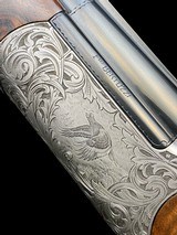 STUNNING-FFLI. BERTUZZI--ROUND BODY O/U -GAME SCENE ENGRAVED- EXHIBITION TURKISH WALNUT- 20GA -30