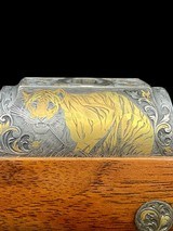 EXHIBITION GRADE - KARL HAUPTMANN
-
416 RIGBY
- STAINLESS - TAKEDOWN
- GOLD GAME SCENE - BONSI ENGRAVED - SWAROVSKI ILLUMINATED SCOPE - 17 of 19