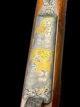 EXHIBITION GRADE - KARL HAUPTMANN
-
416 RIGBY
- STAINLESS - TAKEDOWN
- GOLD GAME SCENE - BONSI ENGRAVED - SWAROVSKI ILLUMINATED SCOPE - 3 of 19