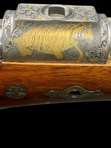 EXHIBITION GRADE - KARL HAUPTMANN
-
416 RIGBY
- STAINLESS - TAKEDOWN
- GOLD GAME SCENE - BONSI ENGRAVED - SWAROVSKI ILLUMINATED SCOPE - 7 of 19