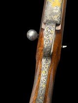 EXHIBITION GRADE - KARL HAUPTMANN
-
416 RIGBY
- STAINLESS - TAKEDOWN
- GOLD GAME SCENE - BONSI ENGRAVED - SWAROVSKI ILLUMINATED SCOPE - 4 of 19